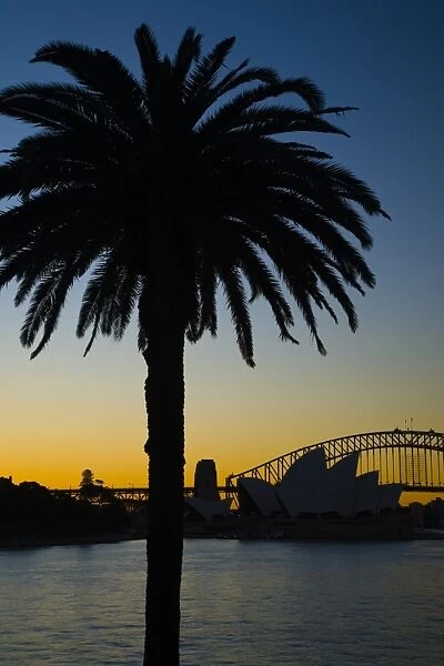 Australia, New South Wales, Sydney. Sydney Harbour bridge and the opera house viewed at sunset