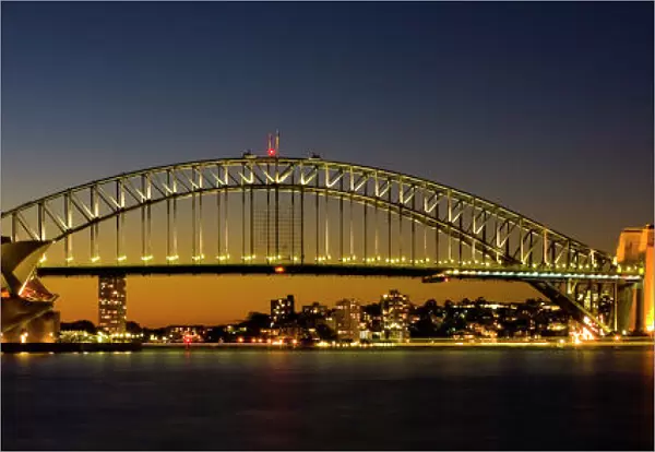 Australia, New South Wales, Sydney. Sydney Harbour bridge and the opera house viewed at dusk
