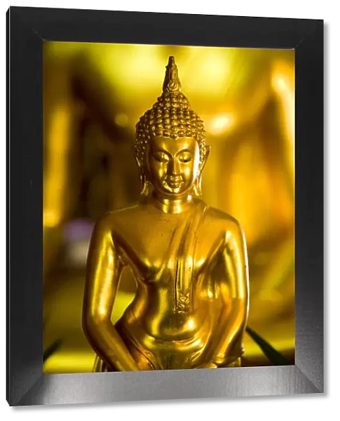 Thailand, Bangkok, Buddha. Gold Buddha statue located at a Wat in Bangkok