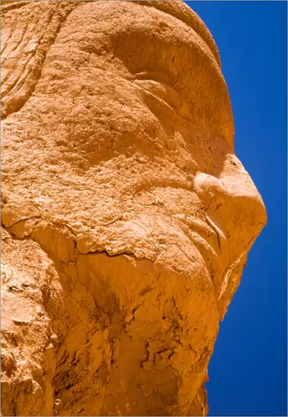 Chile, Atacama Desert, Plaza Quitor. Carved face in the stone wall of the Atacama Desert near the Plaza