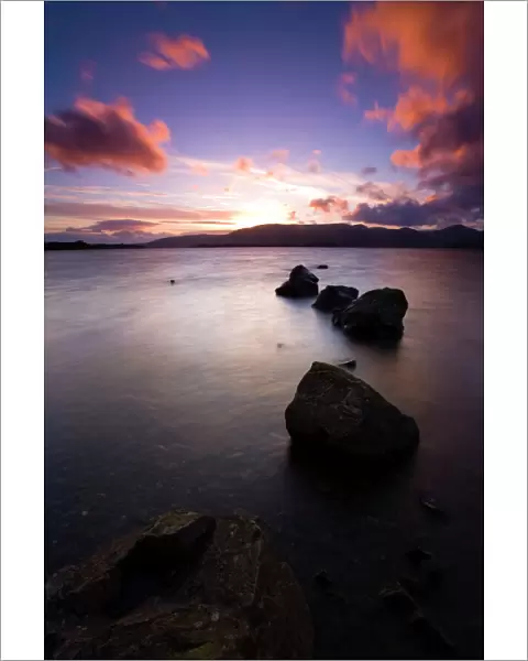 Scotland, Stirling, Loch Lomond and the Trossachs National Park. Sunset over Loch Lomond viewed from the bay