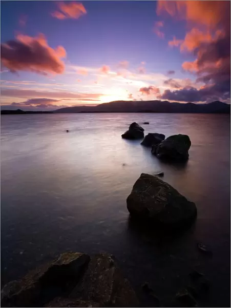 Scotland, Stirling, Loch Lomond and the Trossachs National Park. Sunset over Loch Lomond viewed from the bay
