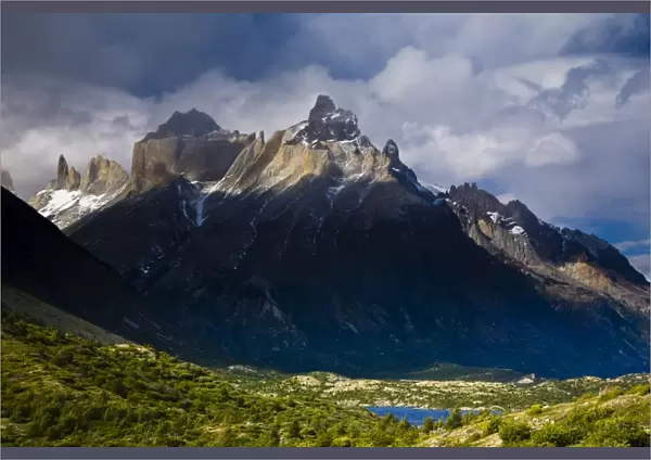 Chile, Southern Patagonia, Torres Del Paine National Park. Late afternoon light illuminates the peaks of the Cuernos