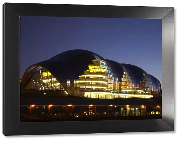 The Sage gateshead building, viewed at night from the Newcastle Upon Tyne quayside