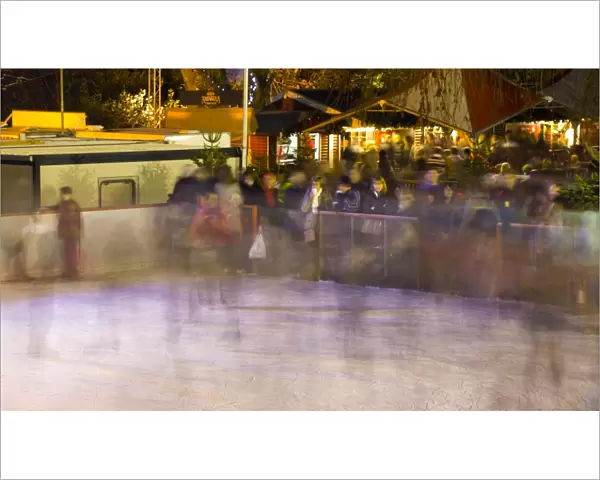 Scotland, Edinburgh, Christmas Fair. Ice rink in the East Princes Street Gardens