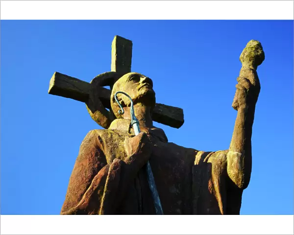 England, Northumberland, Lindisfarne  /  Holy Island. Statue of St. Aidan in the grounds of the Lindisfarne Priory, located upon Holy Island along the Northumberland