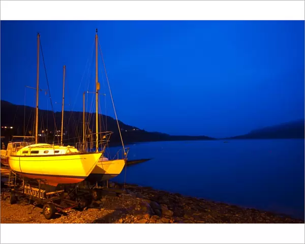 Scotland, Scottish Highlands, Ullapool. Sailing boats moored near the busy port at Ullapool on the shores of