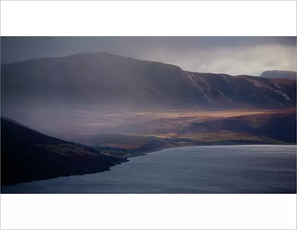 Scotland, Scottish Highlands, Little Loch Broom. Rain clears revealing the mountain peaks surrounding Little
