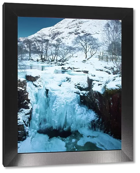 Scotland, Scottish Highlands, Glen Nevis. The frozen Lower Falls located Glen Nevis under the shadow of