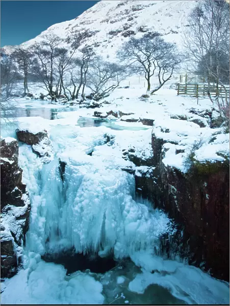 Scotland, Scottish Highlands, Glen Nevis. The frozen Lower Falls located Glen Nevis under the shadow of