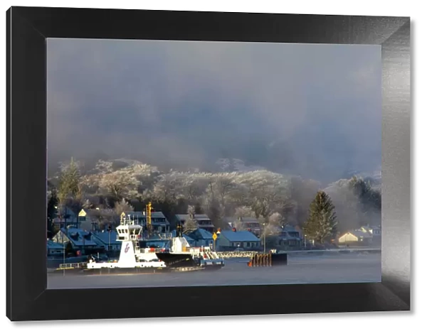 Scotland, Scottish Highlands, Corran. The Corran ferry port with hoarfrost covered woodland behind