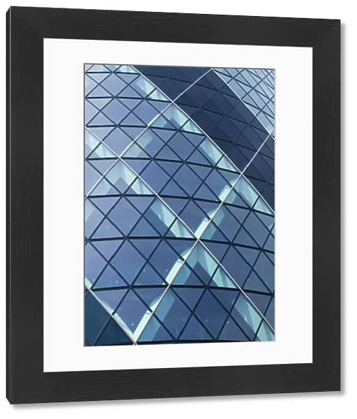 England, Greater London, The City of London. Abstract view of the modern architecture of the famous Gherkin building, in the financial square mile in the City