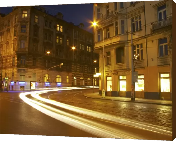 Czech Republic, Prague, Prague City. Cityscape scene of traffic trails at dusk through a busy street in the city