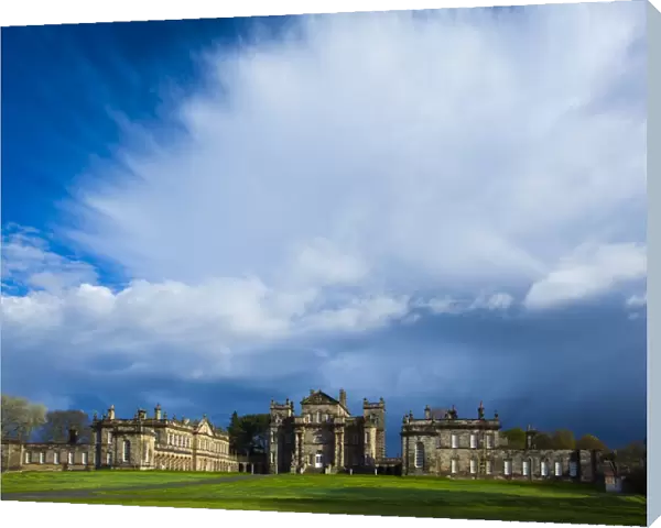England, Northumberland, Seaton Delaval Hall. Dramatic clouds above Seaton Delaval Hall