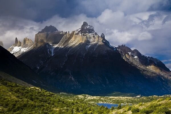 Chile, Southern Patagonia, Torres Del Paine National Park. Late afternoon light illuminates the peaks of the Cuernos