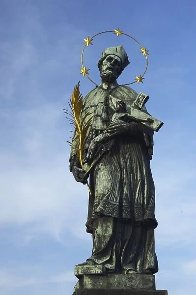 Czech Republic, Prague, Charles Bridge. Gothic statue  /  monument on the popular Charles Bridge of Prague