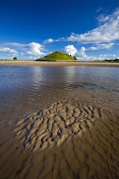 England, Northumberland, Alnmouth. The tidal Aln Estuary at Alnmouth. The hill in the distance is known as
