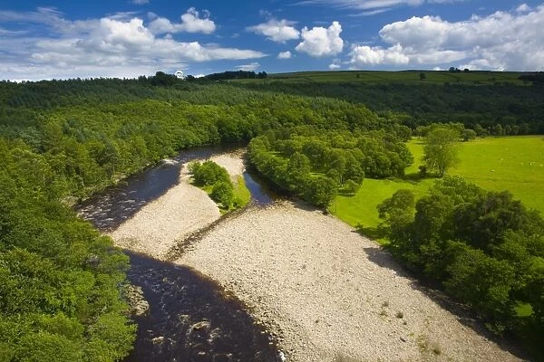 England, Northumberland, Lambley Viaduct. The River South Tyne flowing through a valley of woodland