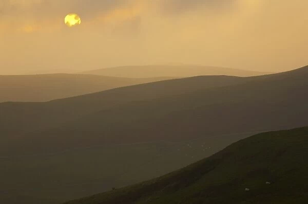 England, Northumberland, Northumberland National Park. Sunset over the rolling Cheviot Hills