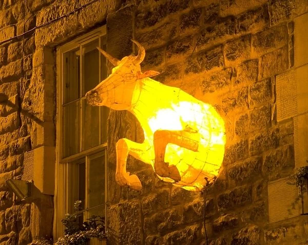 Scotland, Edinburgh, Edinburgh City. Cow lamp on a building near Cowgate