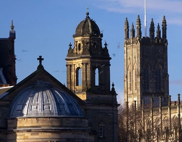 Scotland, Edinburgh, Edinburgh City. Birds flock around the Saint Cuthberts Parish Church