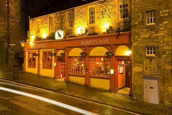 Scotland, Edinburgh, Greyfriars Bobby Bar. Greyfriars Bobbys Bar, a traditional public house located near the Greyfriars Kirk and the monument dedicated to the