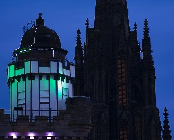 Scotland, Edinburgh, The Royal Mile. The Camera Obscura with The Hub in the background