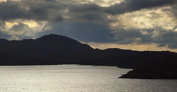 Scotland, Scottish Highlands, Assynt. Clearing storm clouds above Loch Assynt near Lochinver