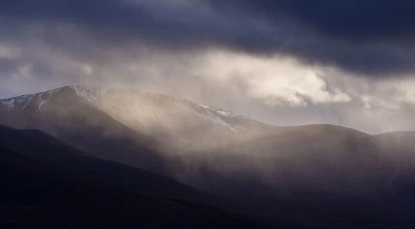 Scotland, Scottish Highlands, Cairngorms National Park. Storm clouds above the mountain known as Stac