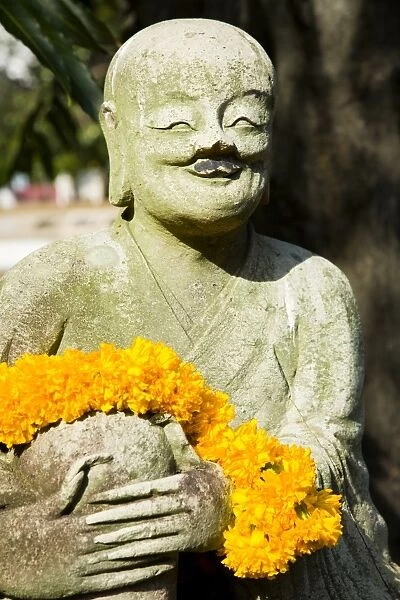 Thailand, Bangkok, Wat Benchamabophit. Statue in the grounds of the Wat Benchamabophit also known as the