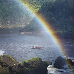 Argentina, Misiones, Iguazu National Park. Rainbow near the impressive Iguazu waterfalls - A world heritage