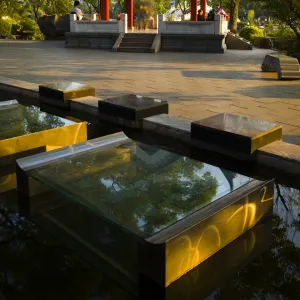 China, Guangxi Zhuang Autonomous Region, Guilin City. Water feature in front of a pagoda in Guilin City