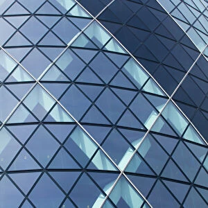 England, Greater London, The City of London. Abstract view of the modern architecture of the famous Gherkin building, in the financial square mile in the City