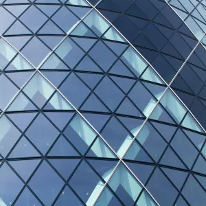 England, Greater London, The City of London. Abstract view of the modern architecture of the famous Gherkin building, in the financial square mile in the City