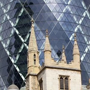 England, Greater London, The City of London. The contrasting architecture of the St Andrew Undershaft Church against a backdrop of the famous