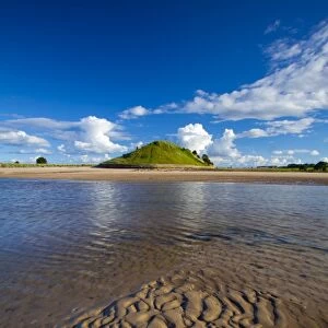 England, Northumberland, Alnmouth. The tidal Aln Estuary at Alnmouth. The hill in the distance is known as