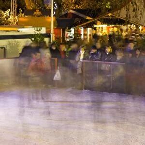Scotland, Edinburgh, Christmas Fair. Ice rink in the East Princes Street Gardens