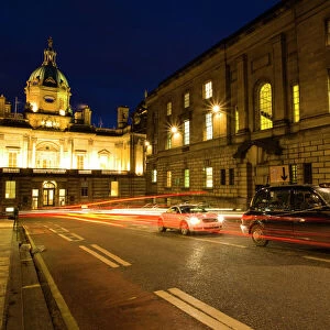 Scotland, Edinburgh, Old Town. A city taxi waiting in traffic on Bank Street