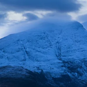 Scotland, Scottish Highlands, Assynt. Clouds clear from the peak of Cal Beag, a mountain in the Assynt parish of Sutherland