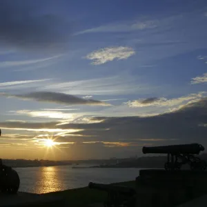 Sunset behind the river Tyne and the Collingwood Cannons