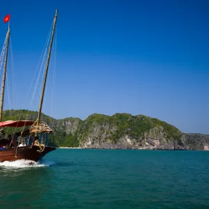 Vietnam, Northern Vietnam, Halong Bay. Tourist boat amid the islands of Halong Bay near Cat Ba Island