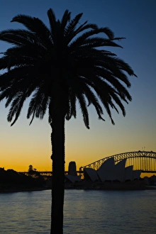 Australia Collection: Australia, New South Wales, Sydney. Sydney Harbour bridge and the opera house viewed at sunset