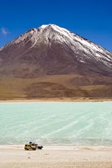 Lake Gallery: Bolivia, Southern Altiplano, Laguna Verde. Tourist trip 4x4s parked near Laguna Verde