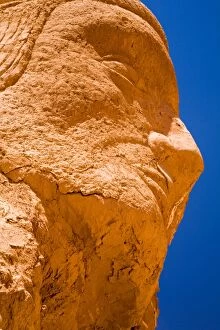 South Gallery: Chile, Atacama Desert, Plaza Quitor. Carved face in the stone wall of the Atacama Desert near