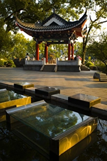 Images Dated 2007 November: China, Guangxi Zhuang Autonomous Region, Guilin City. Water feature in front of a pagoda in Guilin