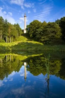 Column Gallery: The column of liberty reflected in a pool forming part of the 18th-century landscaped forest