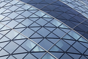 England, Greater London, The City of London. Abstract view of the modern architecture of the famous Gherkin building, in the financial square mile in the City