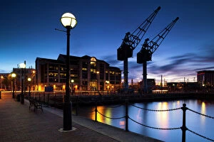 Editor's Picks: England, Greater Manchester, Salford Quays. Cranes overlooking Ontario Basin part of the recently redeveloped Salford Quays in