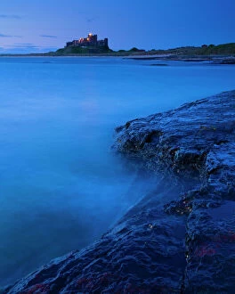 Yorkshire Northern Dreams Collection Gallery: England, Northumberland, Bamburgh. Bamburgh Castle and the North Sea, viewed from Harkess Rocks