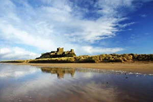 Scenery Gallery: England, Northumberland, Bamburgh Castle. Bamburgh Castle and dunes near Bamburgh village